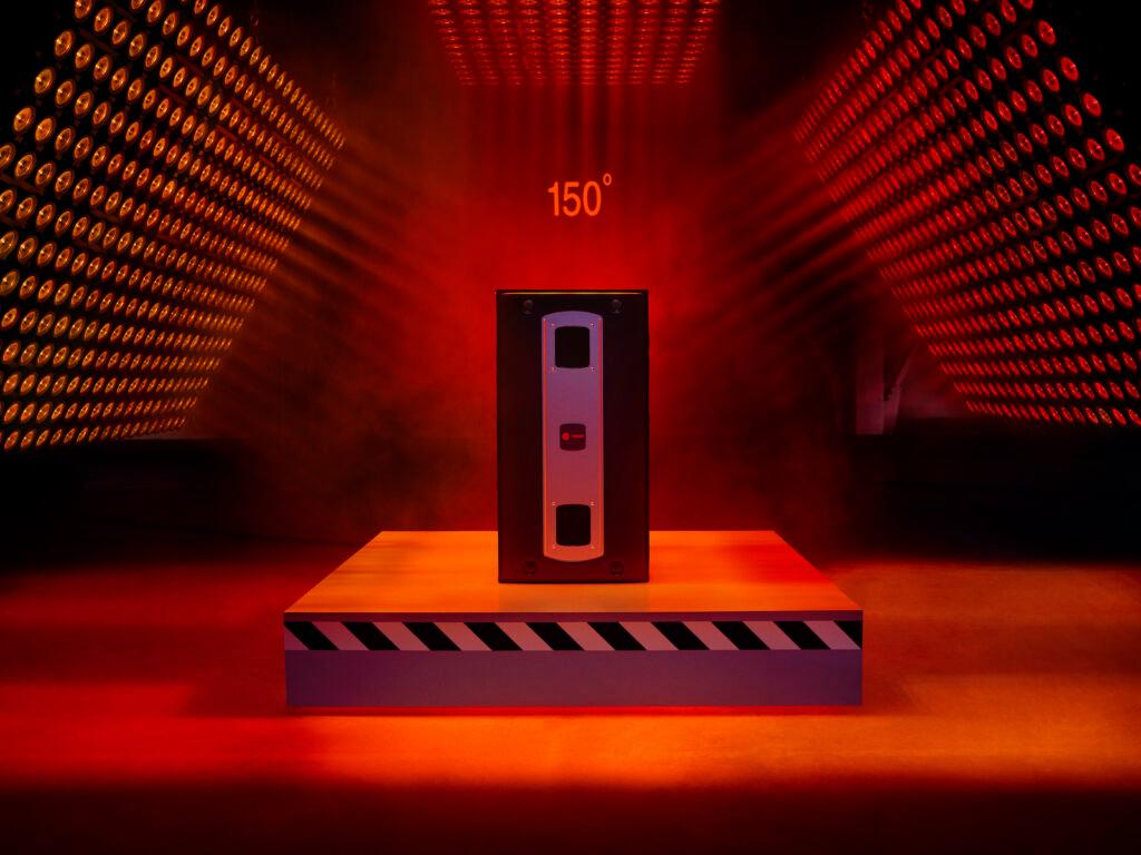 Trane furnace is on a platform inside of a room with glowing red lights and fog.