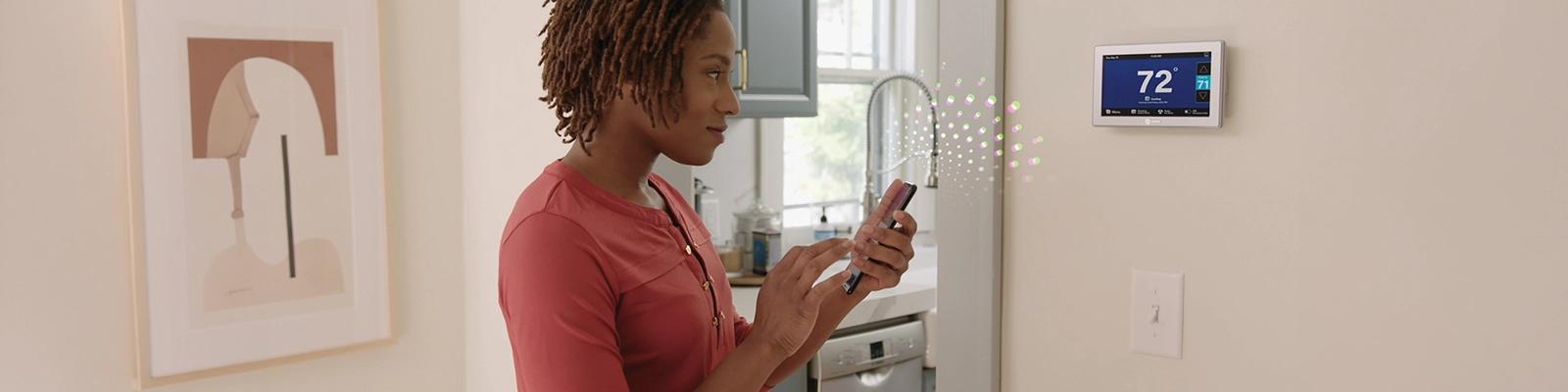 Homeowner Using the Trane Home App.
